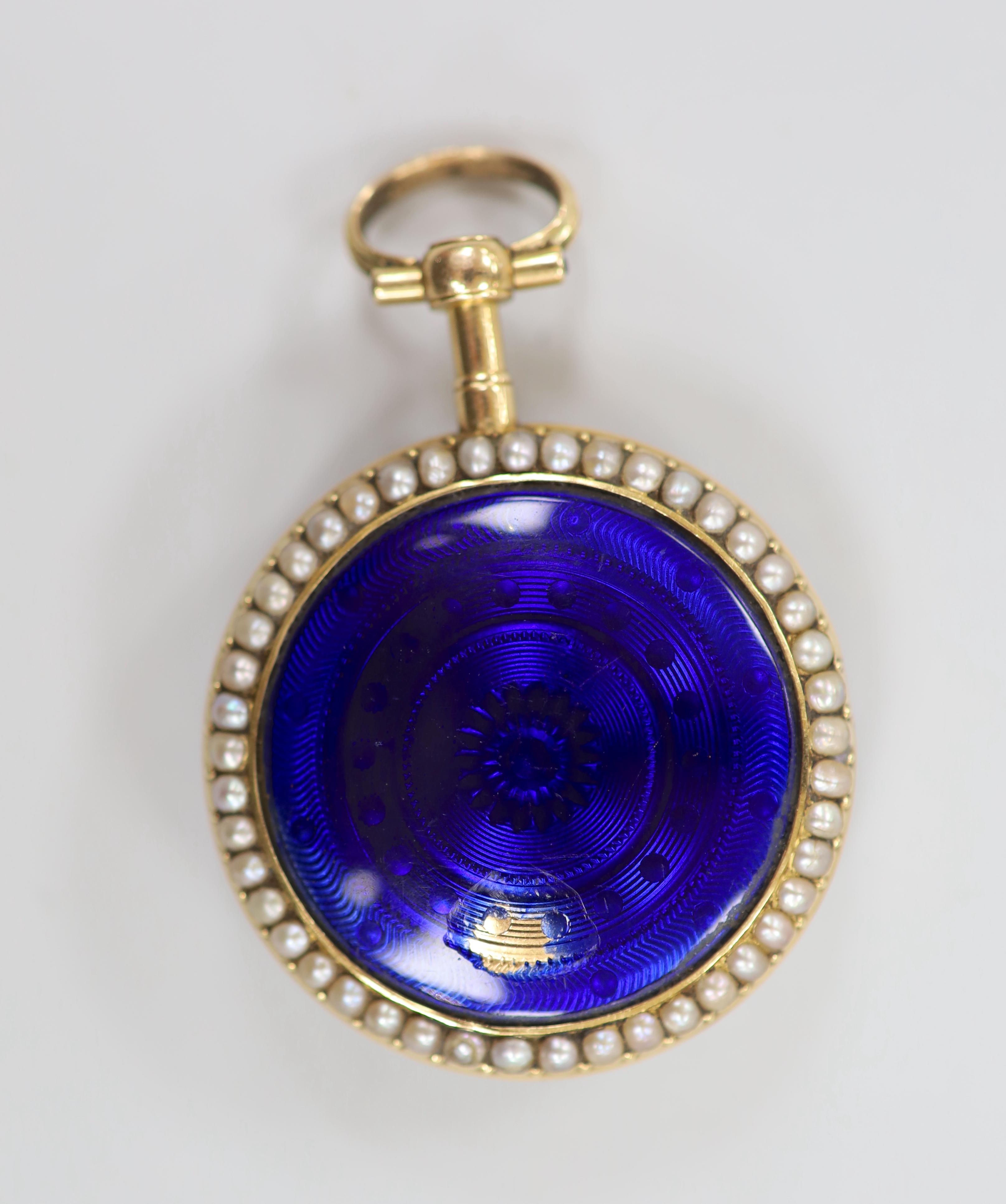 An early 20th century continental yellow metal, split pearl and enamel set open face fob watch, with Roman dial, case diameter 34mm (chip).